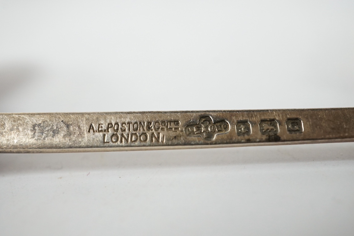 A Victorian silver shaped rectangular vinaigrette, engraved with a scene to commemorate The Great Exhibition at the Crystal Palace in Hyde Park, London, by William Dudley, Birmingham, 1850, 33mm, together with three smal